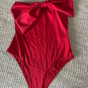 Red Bow Bodysuit (one arm) NEVER WORN